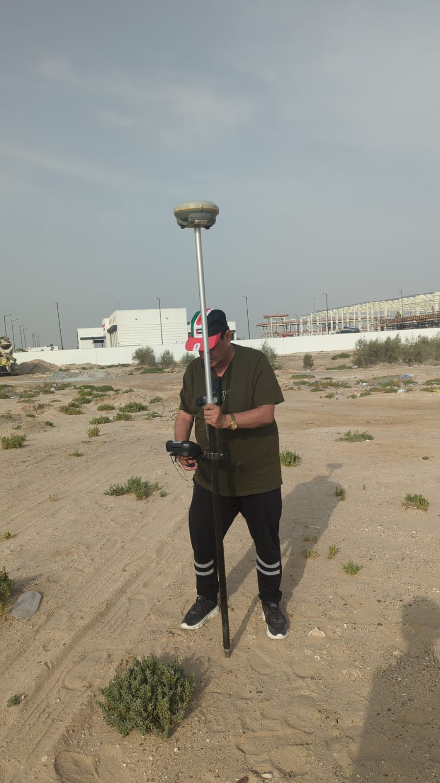 Dr. Fouad Ouakili conducting site measurements at Dubai Industrial City project